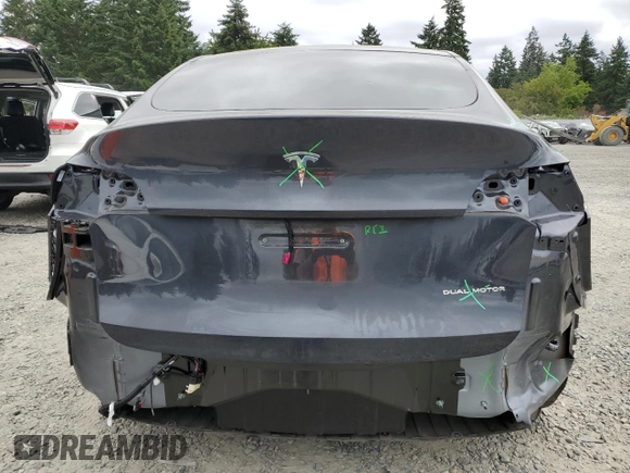 2024 Tesla Model Y Long Range with VIN 7SAYGDEE9RF069801, listed as a Copart auction lot 60857145 with 18,808 mi miles and Salvage title. Bid and sale history available at DreamBid. Image 6.