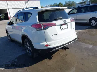 2018 Toyota RAV4 XLE with VIN JTMWFREV8JJ157496, listed as a IAAI auction lot 41816017 with 64,767 mi miles. Bid and sale history available at carsss.com. Image 3.