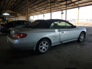 2002 Toyota Solara SE with VIN 2T1FF28PX2C580985, listed as a Copart auction lot 83092354 with 264,668 mi miles and Salvage Title. Bid and sale history available at DreamBid. Image 3.