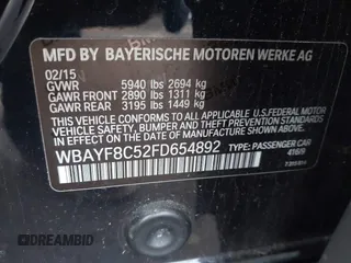 2015 BMW 7 Series 750Li xDrive with VIN WBAYF8C52FD654892, listed as a IAAI auction lot 41368616 with 158,140 mi miles. Bid and sale history available at carsss.com. Image 9.