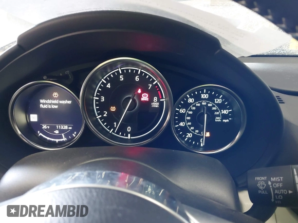 2021 Mazda MX-5 Miata Grand Touring with VIN JM1NDAM73M0451484, listed as a IAAI auction lot 41485044 with 11,328 mi miles and . Bid and sale history available at DreamBid. Image 7.