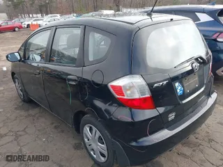 2010 Honda Fit with VIN JHMGE8H29AC037888, listed as a IAAI auction lot 41784180 with 64,855 mi miles. Bid and sale history available at carsss.com. Image 3.