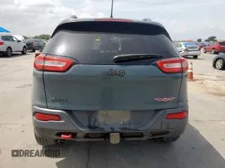 2014 Jeep Cherokee Trailhawk with VIN 1C4PJMBS0EW185737, listed as a Copart auction lot 63463015 with 199,983 mi miles and Clean title. Bid and sale history available at DreamBid. Image 6.