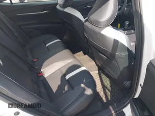 2025 Toyota Camry LE with VIN 4T1DAACK9SU084957, listed as a IAAI auction lot 41688859 with 7,396 mi miles and . Bid and sale history available at DreamBid. Image 8.