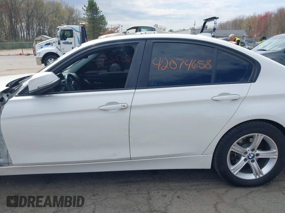 2015 BMW 3 Series 328i xDrive with VIN WBA3B5C51FF960765, listed as a IAAI auction lot 42074658 with 106,598 mi miles and . Bid and sale history available at DreamBid. Image 15.