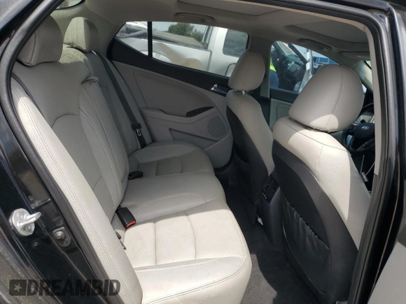 2013 Kia Optima EX с VIN 5XXGN4A76DG246591, выставлен на аукционе Copart как лот 60995845 с пробегом 179 314 миль миль и Списание • Salvage title. История ставок и продаж доступна на DreamBid. Изображение 10.