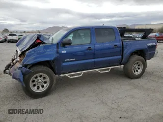 2014 Toyota Tacoma with VIN 5TFLU4EN7EX106909, listed as a Copart auction lot 46906235 with 102,681 mi miles and Salvage Title. Bid and sale history available at DreamBid. Image 1.