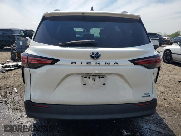 2021 Toyota Sienna XLE с VIN 5TDJRKEC9MS035373, выставлен на аукционе Copart как лот 56538525 с пробегом 64 669 миль миль и Списание • Salvage title. История ставок и продаж доступна на DreamBid. Изображение 6.