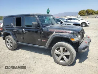 2018 Jeep Wrangler Unlimited Rubicon with VIN 1C4HJXFG1JW125326, listed as a Copart auction lot 62655395 with 33,920 mi miles and Clean title. Bid and sale history available at DreamBid. Image 4.