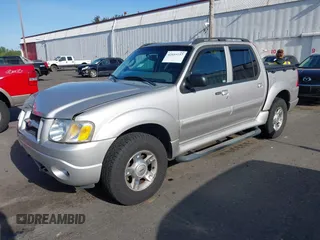 2004 Ford Explorer Sport Trac XLS z VIN 1FMDU77K74UB69268, wystawiony jako IAAI lot #42055157 z przebiegiem 127 573 mil mil oraz . Historia ofert i sprzedaży dostępna na DreamBid. Obrazek 2.