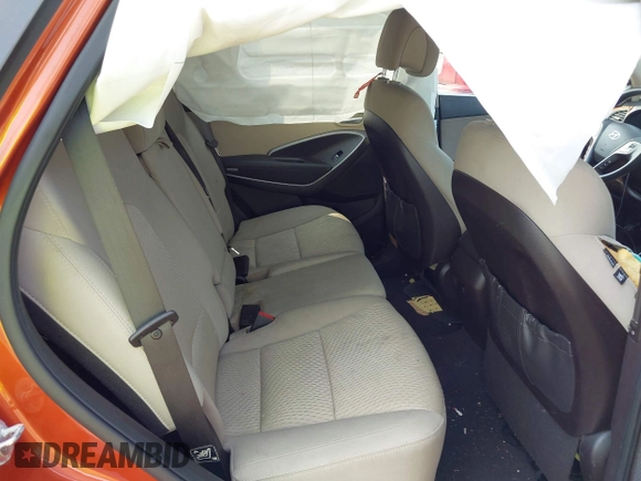 2014 Hyundai Santa Fe z VIN 5XYZTDLB0EG208769, wystawiony jako IAAI lot #42485411 z przebiegiem 82 173 mil mil oraz . Historia ofert i sprzedaży dostępna na DreamBid. Obrazek 8.
