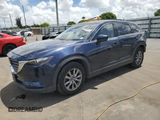 2018 Mazda CX-9 Touring z VIN JM3TCBCY3J0235048, wystawiony jako Copart lot #61043915 z przebiegiem 82 869 mil mil oraz Szkoda całkowita • Salvage title. Historia ofert i sprzedaży dostępna na DreamBid. Obrazek 1.