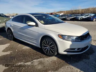 2014 Volkswagen CC VR6 Executive 4Motion with VIN WVWGU7AN4EE531587, listed as a Copart auction lot 79768104 with 77,333 mi miles and Salvage Title. Bid and sale history available at carsss.com. Image 4.