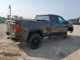 2023 GMC Sierra 1500 with VIN 1GTVUCE82PZ335387, listed as a Copart auction lot 63642514 with 6,106 mi miles and Salvage Title. Bid and sale history available at DreamBid. Image 3.