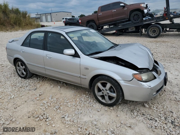 2003 Mazda Protege DX with VIN JM1BJ226631162054, listed as a Copart auction lot 70961034 with 85,794 mi miles and Salvage Title. Bid and sale history available at carsss.com. Image 4.