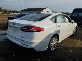 2019 Ford Fusion Hybrid SE with VIN 3FA6P0LU9KR195657, listed as a Copart auction lot 65602392 with 47,160 mi miles. Bid and sale history available at carsss.com. Image 4.