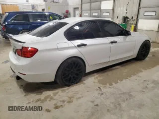 2013 BMW 3 Series 335i with VIN WBA3A9G51DNP36712, listed as a Copart auction lot 52407465 with 117,972 mi miles and Salvage title. Bid and sale history available at DreamBid. Image 3.