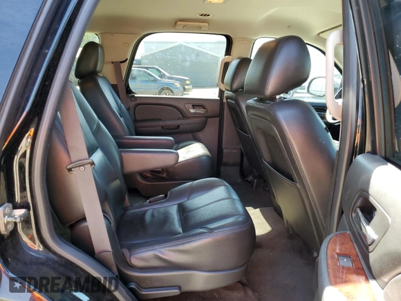 2014 Chevrolet Tahoe LT with VIN 1GNSCBE07ER115998, listed as a Copart auction lot 59577485 with 154,486 mi miles and Salvage title. Bid and sale history available at DreamBid. Image 11.