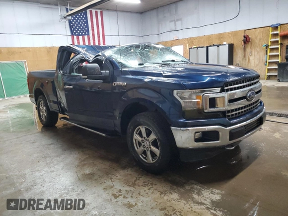 2018 Ford F-150 XL with VIN 1FTFX1E57JFE75983, listed as a Copart auction lot 52619685 with 184,124 mi miles and Clean title. Bid and sale history available at DreamBid. Image 4.