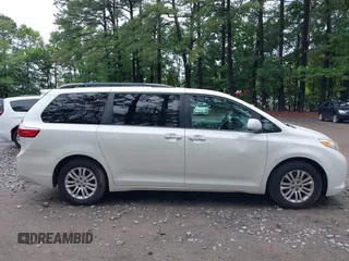 2016 Toyota Sienna XLE with VIN 5TDYK3DC9GS756582, listed as a IAAI auction lot 42506733 with 155,678 mi miles and . Bid and sale history available at DreamBid. Image 13.