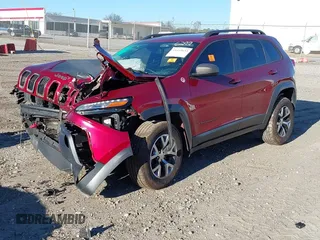 2014 Jeep Cherokee Trailhawk z VIN 1C4PJMBS8EW186277, wystawiony jako IAAI lot #41245653 z przebiegiem Nie podano mil oraz . Historia ofert i sprzedaży dostępna na DreamBid. Obrazek 2.