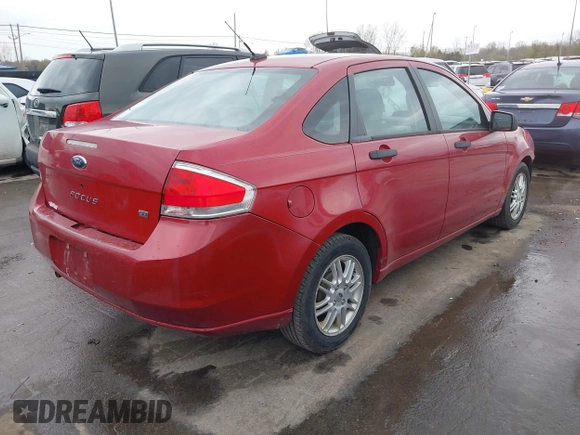 2009 Ford Focus SE with VIN 1FAHP35N09W136732, listed as a IAAI auction lot 42061783 with 143,993 mi miles. Bid and sale history available at carsss.com. Image 4.