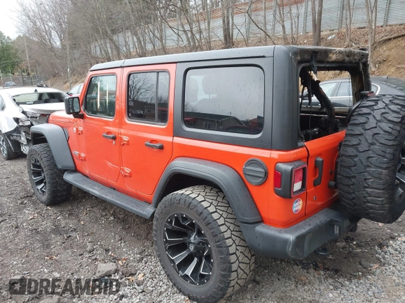 2018 Jeep Wrangler Unlimited Sport z VIN 1C4HJXDN4JW198045, wystawiony jako IAAI lot #41930547 z przebiegiem 62 402 mil mil oraz . Historia ofert i sprzedaży dostępna na DreamBid. Obrazek 3.