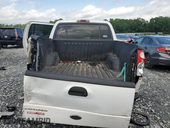 2001 Ford Explorer Sport Trac with VIN 1FMZU67E51UA46266, listed as a Copart auction lot 56628755 with 210,524 mi miles and Salvage title. Bid and sale history available at DreamBid. Image 6.