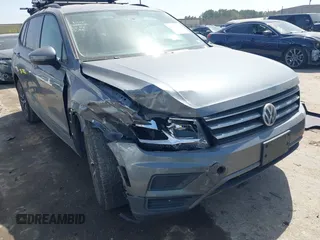 2021 Volkswagen Tiguan S with VIN 3VV1B7AX6MM027114, listed as a IAAI auction lot 41778035 with 81,075 mi miles and . Bid and sale history available at DreamBid. Image 6.