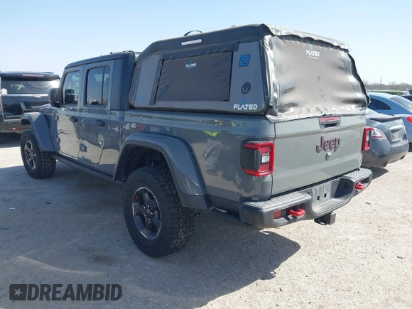 2022 Jeep Gladiator Rubicon z VIN 1C6JJTBG2NL167034, wystawiony jako IAAI lot #41854225 z przebiegiem Nie podano mil oraz . Historia ofert i sprzedaży dostępna na DreamBid. Obrazek 3.