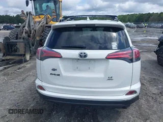 2017 Toyota RAV4 LE with VIN JTMBFREV8HJ700774, listed as a IAAI auction lot 42439345 with 96,907 mi miles and . Bid and sale history available at DreamBid. Image 16.