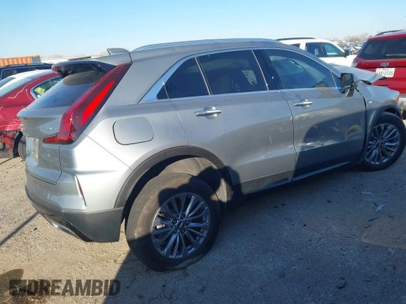 2024 Cadillac XT4 FWD Premium Luxury с VIN 1GYFZCR40RF158284, выставлен на аукционе IAAI как лот 41366150 с пробегом Не указан миль и . История ставок и продаж доступна на DreamBid. Изображение 4.