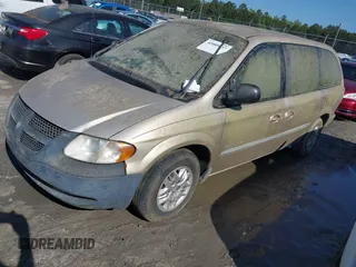 2001 Dodge Caravan Sport with VIN 2B8GP44G21R129935, listed as a IAAI auction lot 42009037 with Not Provided miles and . Bid and sale history available at carsss.com. Image 2.
