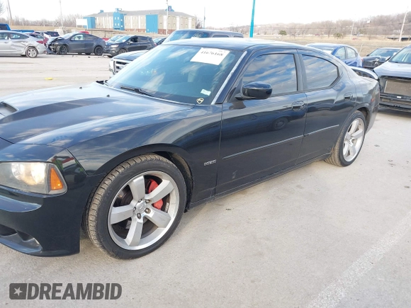2006 Dodge Charger SRT-8 with VIN 2B3LA73W96H371246, listed as a IAAI auction lot 41676168 with 130,064 mi miles and . Bid and sale history available at carsss.com. Image 6.
