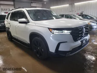 2024 Honda Pilot Elite with VIN 5FNYG1H80RB033478, listed as a Copart auction lot 47373885 with 9,782 mi miles and Salvage Title. Bid and sale history available at carsss.com. Image 4.