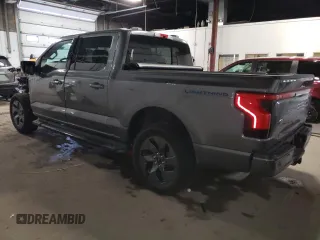 2022 Ford F-150 Lightning Pro z VIN 1FT6W1EV7NWG10033, wystawiony jako Copart lot #81516533 z przebiegiem 11 282 mil mil oraz Szkody całkowita. Historia ofert i sprzedaży dostępna na DreamBid. Obrazek 2.