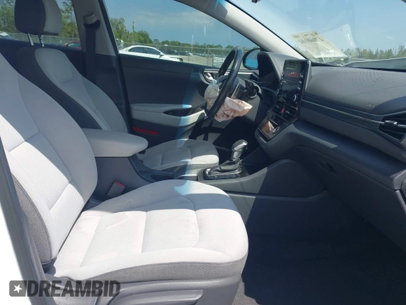 2022 Hyundai Ioniq SE z VIN KMHC75LC1NU282432, wystawiony jako IAAI lot #42060104 z przebiegiem 35 700 mil mil oraz . Historia ofert i sprzedaży dostępna na DreamBid. Obrazek 5.