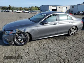 2018 Mercedes-Benz E 300 with VIN WDDZF4JBXJA409492, listed as a Copart auction lot 55306905 with Not provided miles and Salvage title. Bid and sale history available at DreamBid. Image 1.