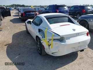 2020 Mazda MX-5 Miata Grand Touring с VIN JM1NDAM73L0414658, выставлен на аукционе IAAI как лот 42451595 с пробегом 73 339 миль миль и . История ставок и продаж доступна на DreamBid. Изображение 3.