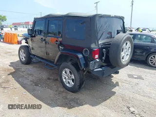 2008 Jeep Wrangler Unlimited Sahara with VIN 1J4GA59128L608515, listed as a IAAI auction lot 42627584 with 157,821 mi miles and . Bid and sale history available at DreamBid. Image 3.