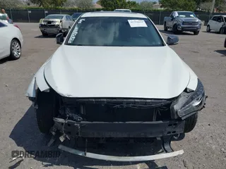 2014 Infiniti Q50 with VIN JN1BV7AP2EM671929, listed as a IAAI auction lot 41794659 with 77,930 mi miles. Bid and sale history available at carsss.com. Image 6.