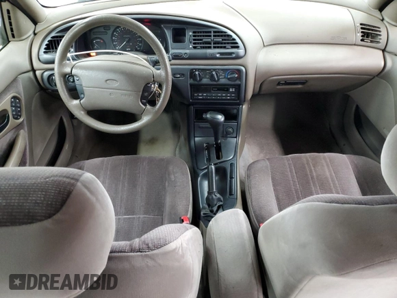 1995 Ford Contour LX with VIN 1FALP6531SK243263, listed as a Copart auction lot 50590725 with 105,347 mi miles and Salvage title. Bid and sale history available at DreamBid. Image 8.