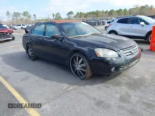 2002 Nissan Altima S with VIN 1N4AL11D52C178433, listed as a IAAI auction lot 41792610 with 216,659 mi miles. Bid and sale history available at carsss.com. Image 1.