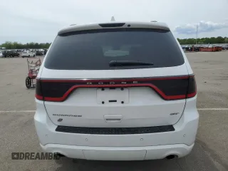 2018 Dodge Durango с VIN NY76958, выставлен на аукционе Copart как лот 55122245 с пробегом 102 413 миль миль и Списание • Salvage title. История ставок и продаж доступна на DreamBid. Изображение 6.
