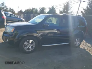 2011 Honda Pilot EX-L with VIN 5FNYF4H51BB023347, listed as a IAAI auction lot 41877106 with 167,039 mi miles. Bid and sale history available at carsss.com. Image 15.
