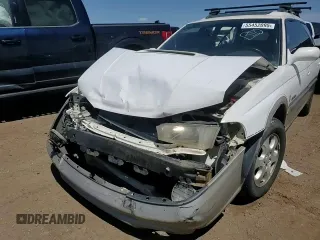 1999 Subaru Legacy Outback with VIN 4S3BG6855X7645042, listed as a Copart auction lot 55452095 with 159,874 mi miles and Salvage title. Bid and sale history available at DreamBid. Image 13.