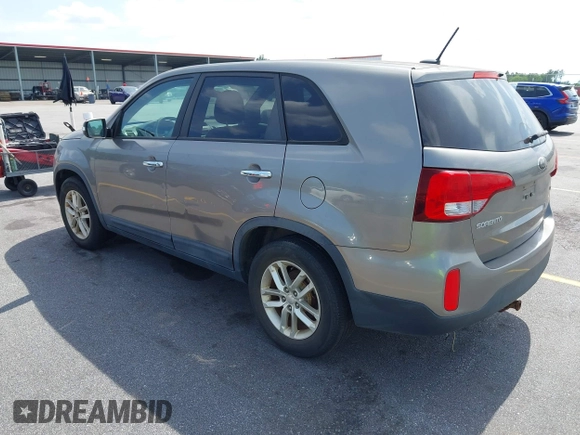 2014 Kia Sorento LX with VIN 5XYKT3A60EG486699, listed as a IAAI auction lot 42143270 with 127,190 mi miles and . Bid and sale history available at DreamBid. Image 3.