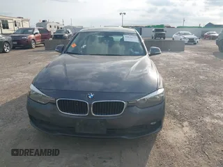 2016 BMW 3 Series 320i with VIN WBA8E1G58GNT38199, listed as a IAAI auction lot 42030548 with 116,179 mi miles and . Bid and sale history available at carsss.com. Image 12.