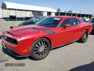 2013 Dodge Challenger SXT z VIN 2C3CDYAG5DH662965, wystawiony jako Copart lot #59603565 z przebiegiem 133 837 mil mil oraz Szkoda całkowita • Salvage title. Historia ofert i sprzedaży dostępna na DreamBid. Obrazek 1.