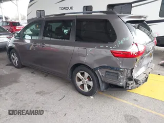 2015 Toyota Sienna LE AAS with VIN 5TDKK3DC8FS585957, listed as a IAAI auction lot 41888825 with 157,364 mi miles and . Bid and sale history available at DreamBid. Image 3.